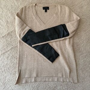 J.Crew tan sweater with black leather sleeve pads